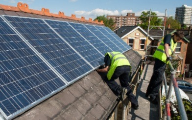 Employees Installing Solar Panels