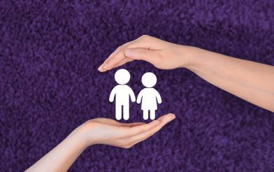 Hands Surrounding Child Figures