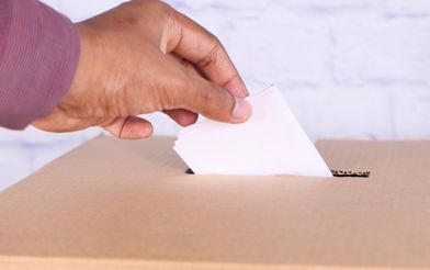 Casting a vote in a ballot box