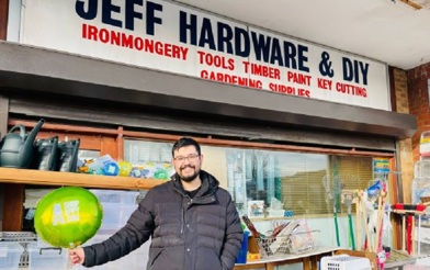 Jeff Hardware and DIY Shop front with worker outside smiling, showing a ShopAppy balloon.